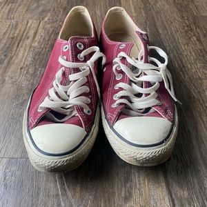 Maroon converse.
